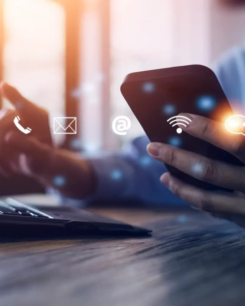 Contact us or Customer support hotline people connect. Businessman using a laptop and touching on virtual screen contact icons email, address, live chat, internet wifi.